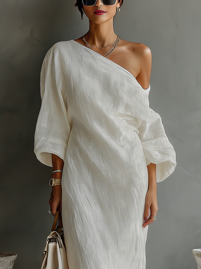 Elegant Flowing Ivory White Dress with Off-Shoulder