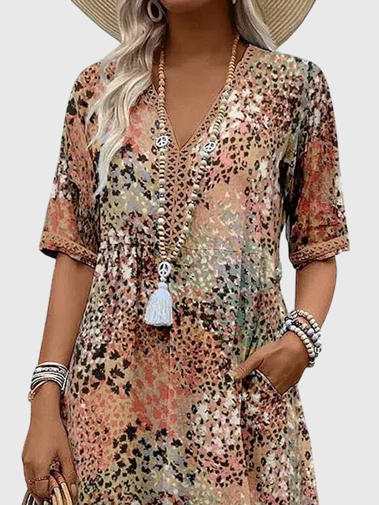 Yvonna | Vestido midi elegante con estampado floral