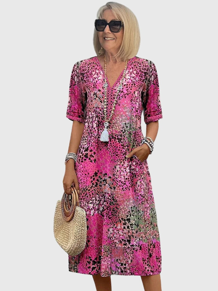 Yvonna | Vestido midi elegante con estampado floral