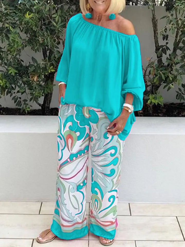 Two-piece set with women's trousers and off-shoulder top