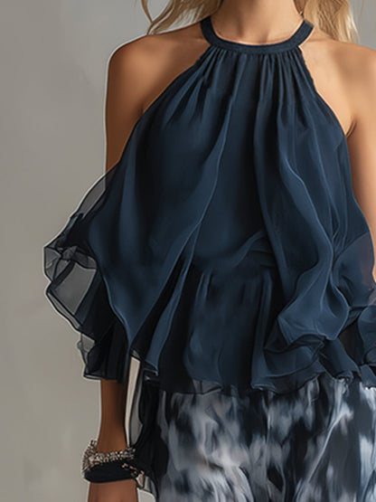 Ludovica - elegant in chiffon with a high-neck top and wide printed trousers