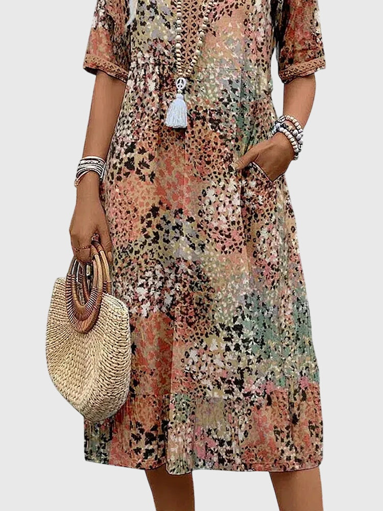 Yvonna | Vestido midi elegante con estampado floral