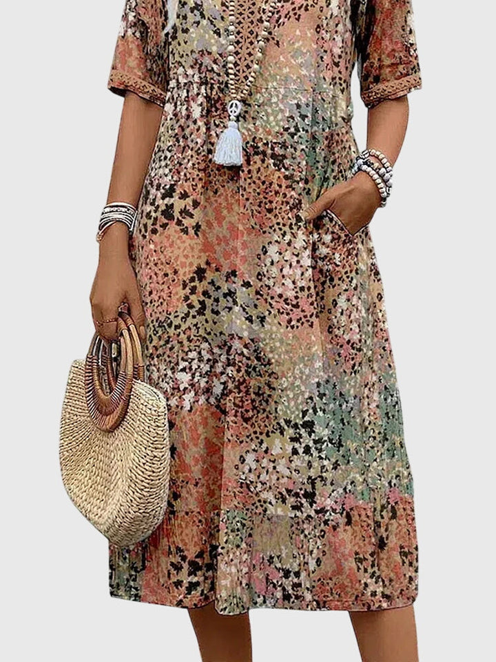Yvonna | Vestido midi elegante con estampado floral