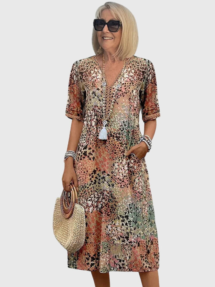 Yvonna | Vestido midi elegante con estampado floral