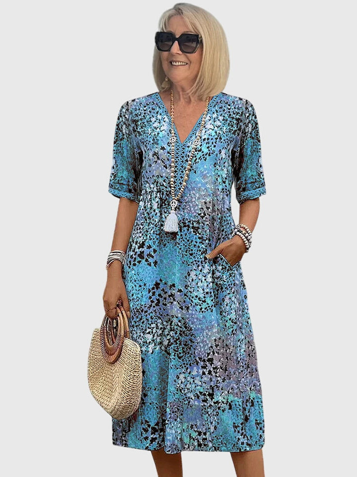 Yvonna | Vestido midi elegante con estampado floral