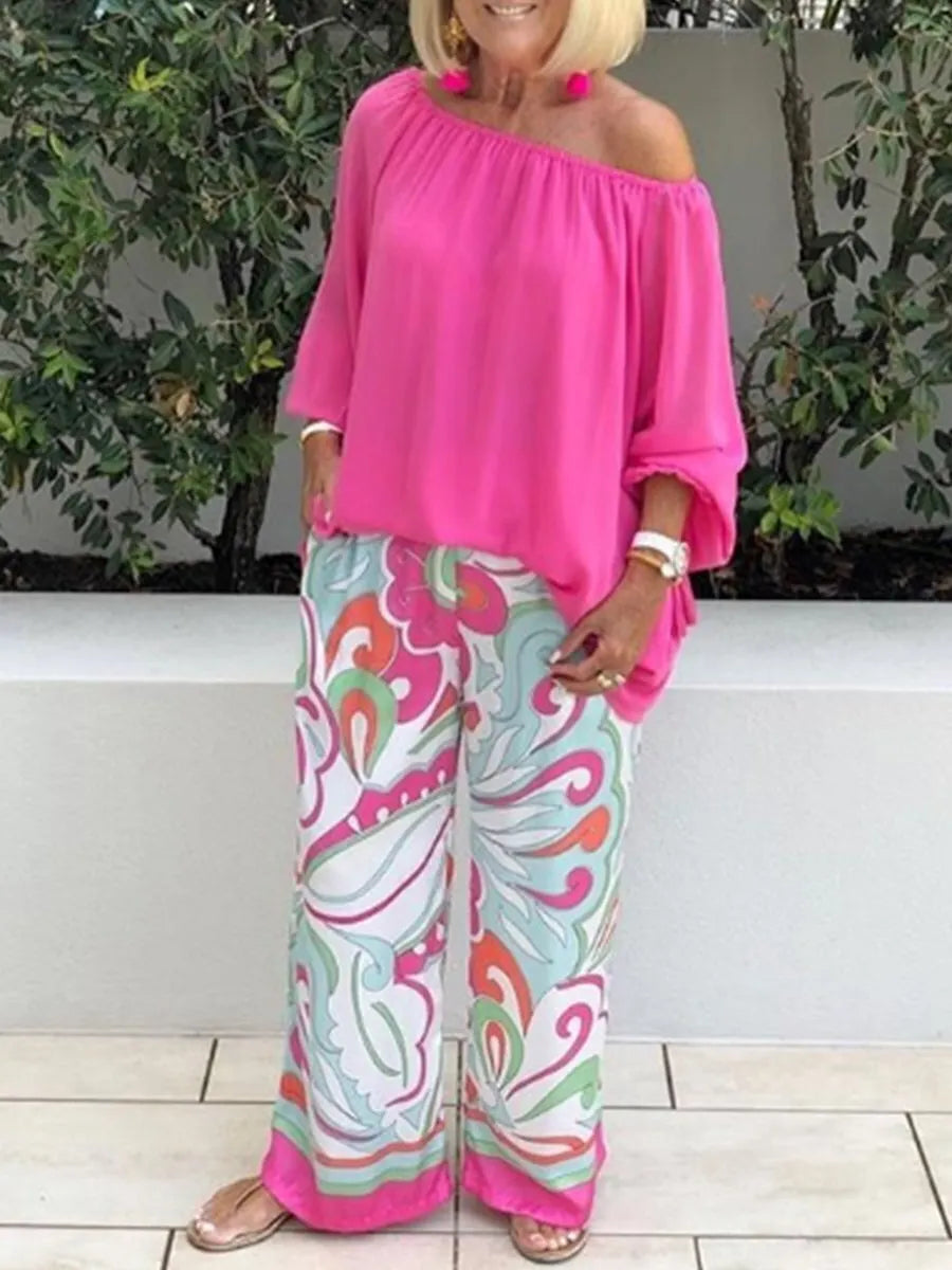 Two-piece set with women's trousers and off-shoulder top