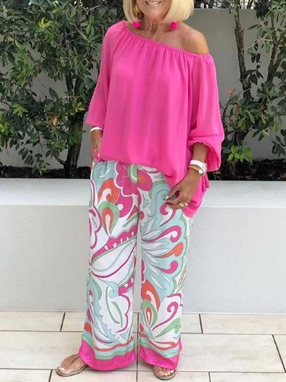 Two-piece set with women's trousers and off-shoulder top