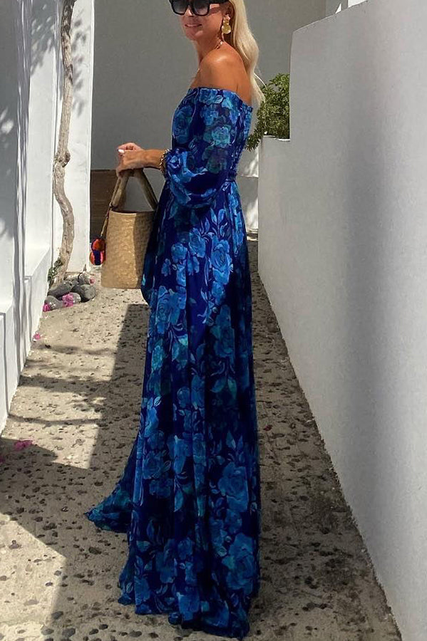 Long dress with floral print and off-the-shoulder sleeves