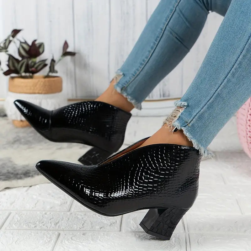 Botines elegantes de mujer con textura de reptil