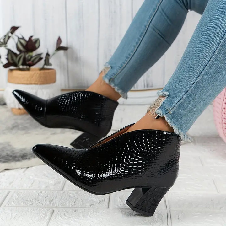 Botines elegantes de mujer con textura de reptil