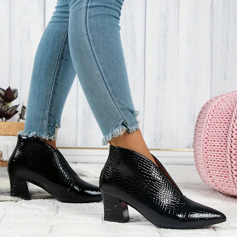 Botines elegantes de mujer con textura de reptil