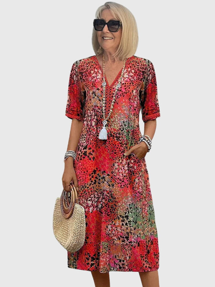 Yvonna | Vestido midi elegante con estampado floral